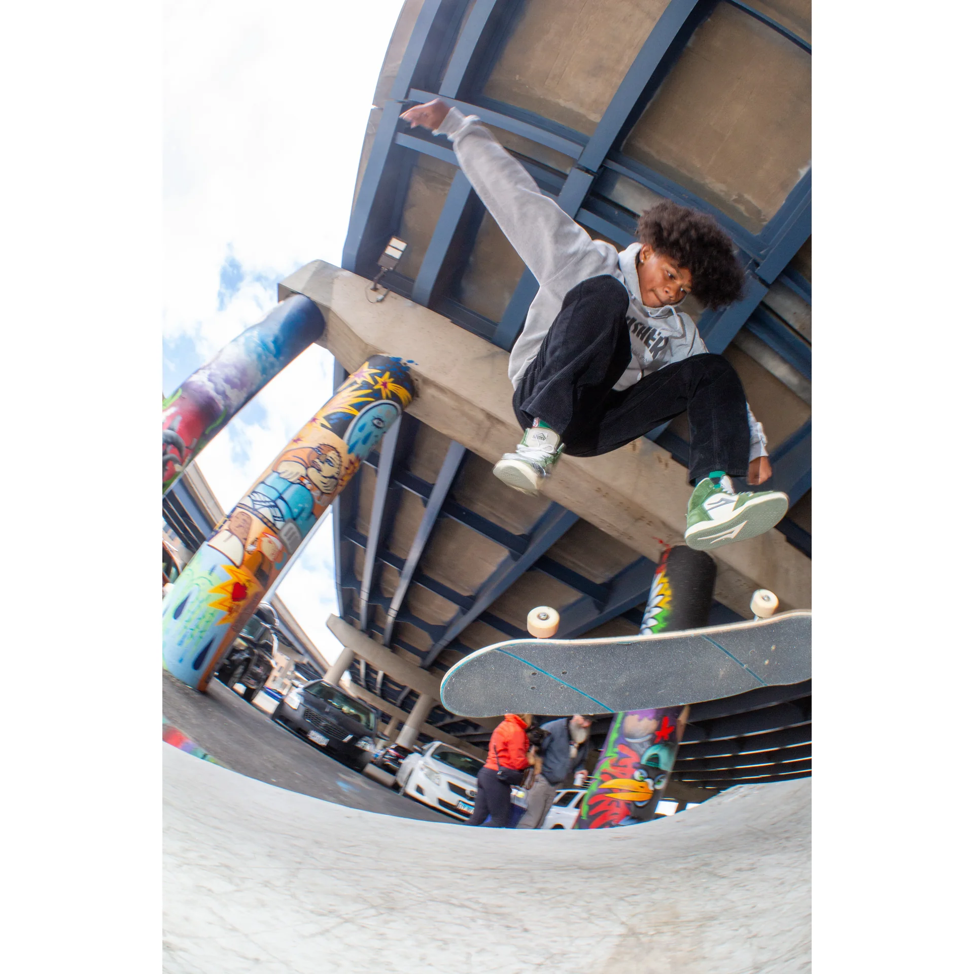 Young skater doing a flip trick at National DIY