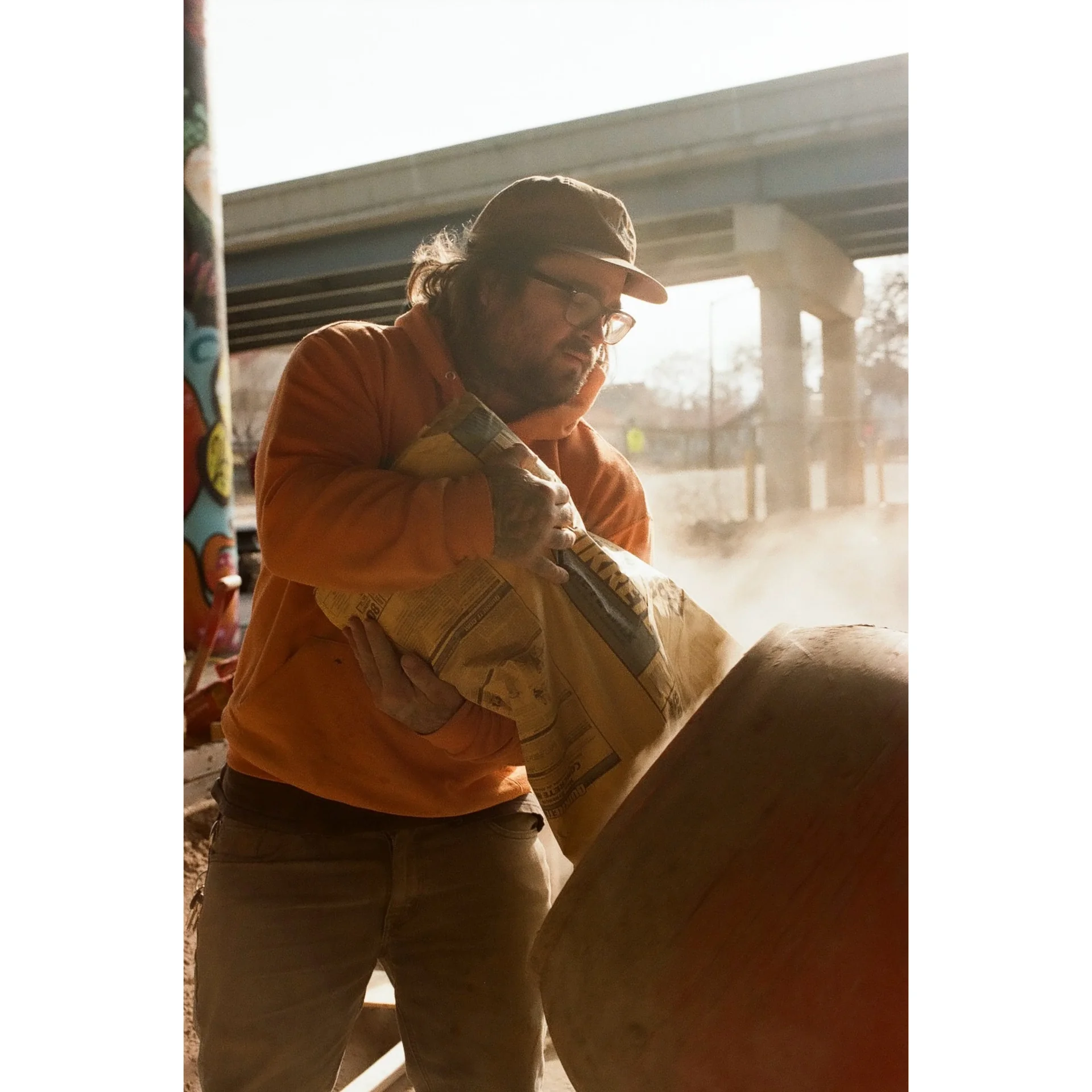 Jon Bartels pouring concrete